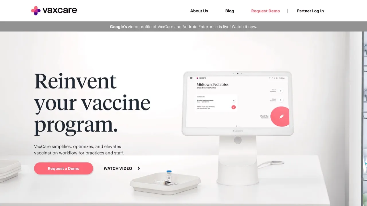 The Vaxcare homepage, with the headline “Reinvent your vaccine program” beside a tablet on a stand